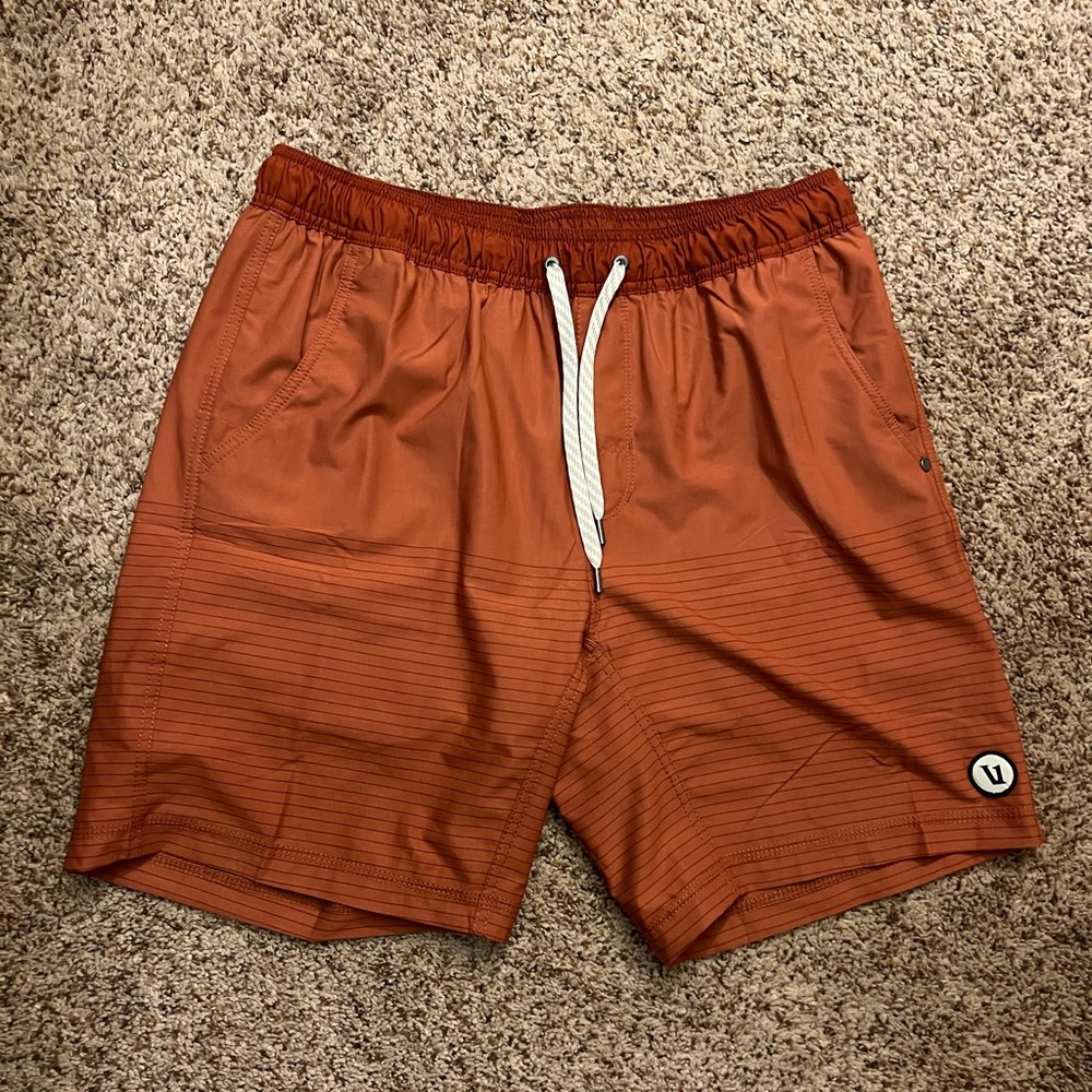 Vuori Men's Athletic Shorts in Rust